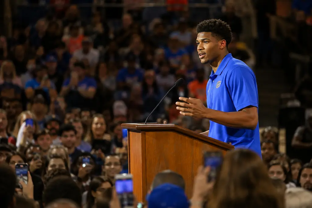 Florida Gators No. 1 basketball players gather with fans after a home court celebration
