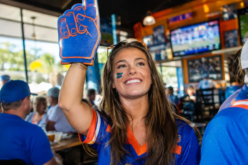 Florida Gators No. 1 celebration with fans gathering around a Gainesville basketball arena